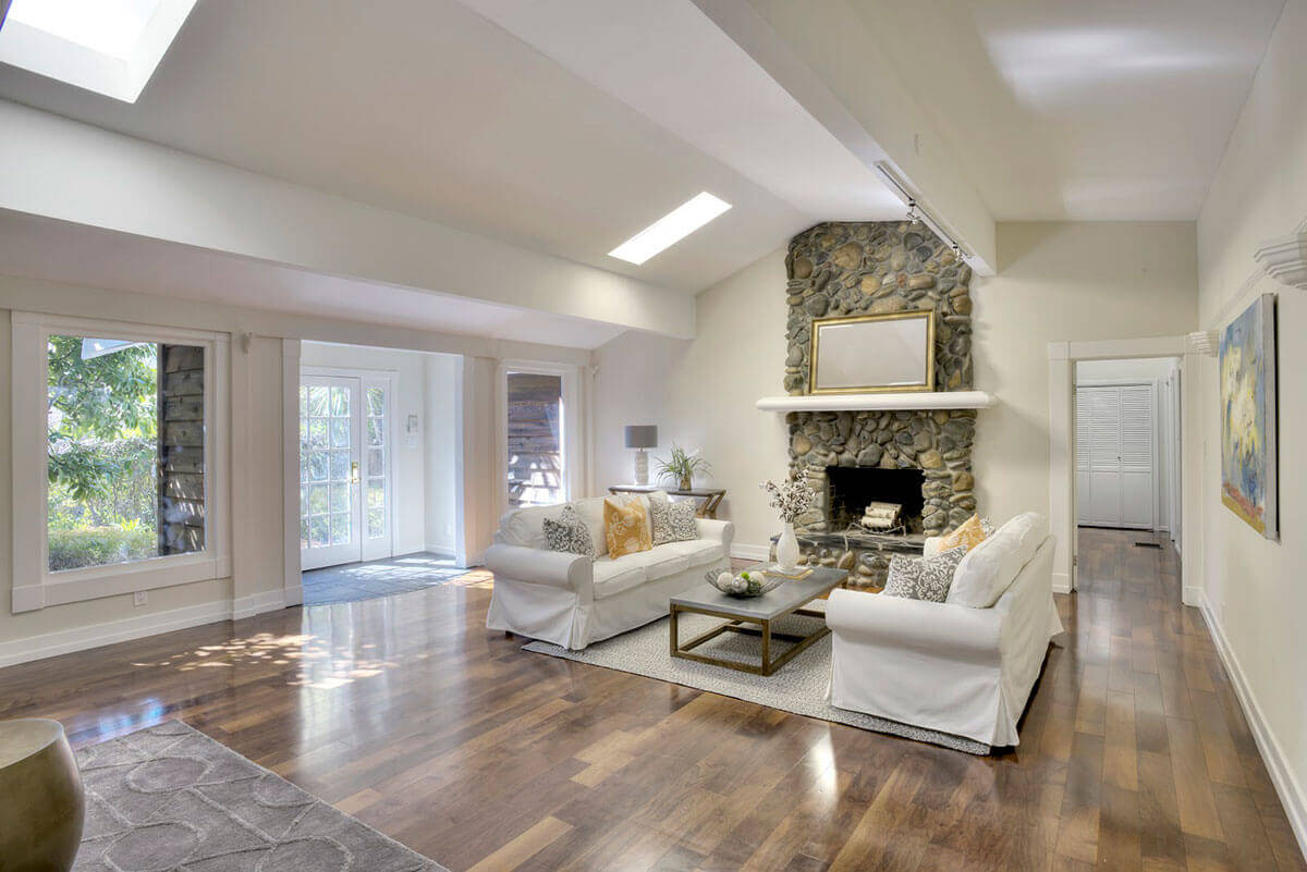 Updated, airy, spacious, elegant, bright, and staged living room, after using concierge